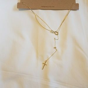 Gold infinity necklace.